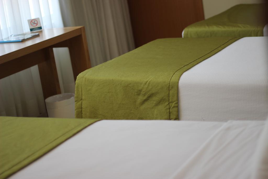 Naoum Hotel Brazíliaváros Szoba fotó